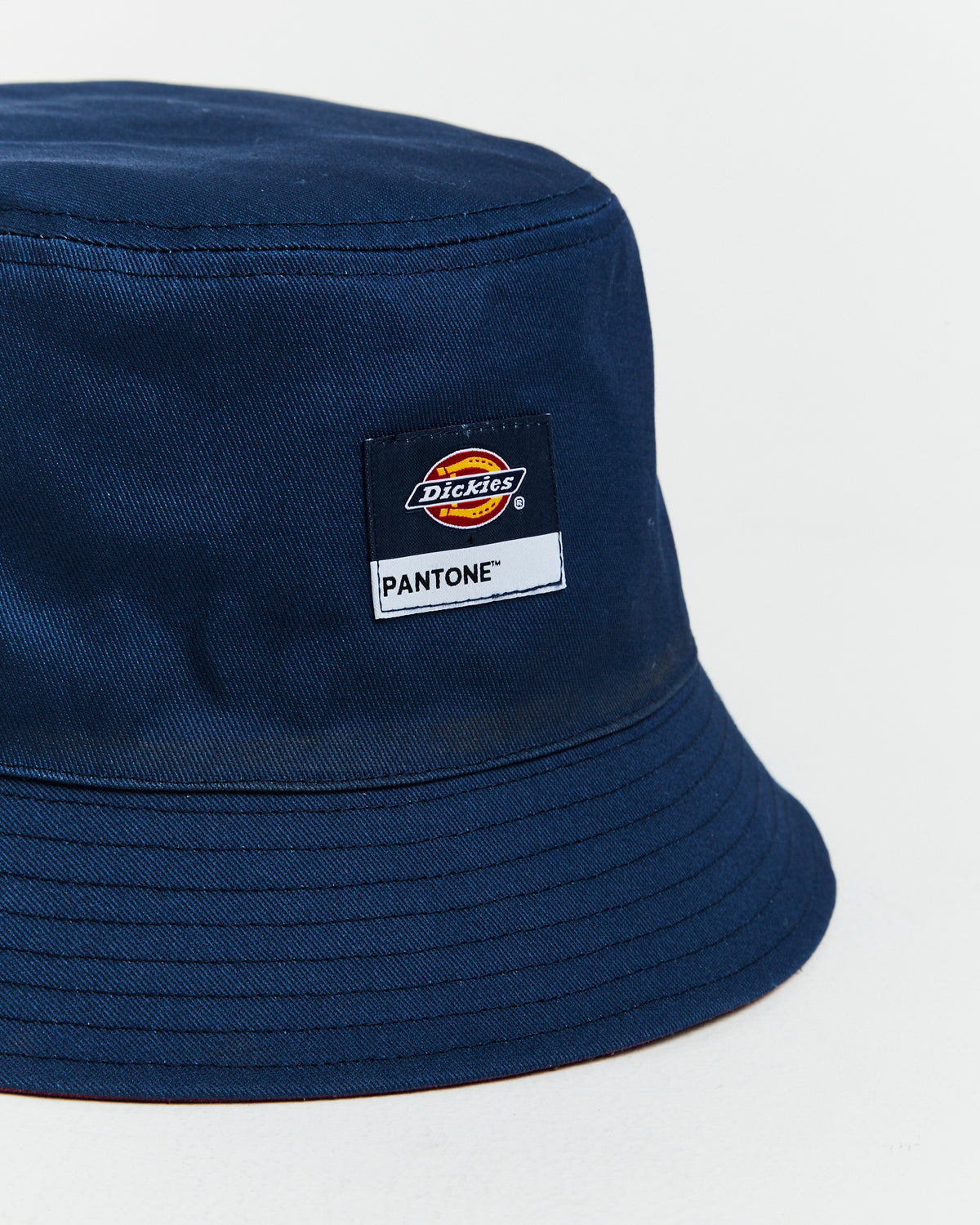 Reversible Bucket Hat in Dark Denim and Malaga BLUE